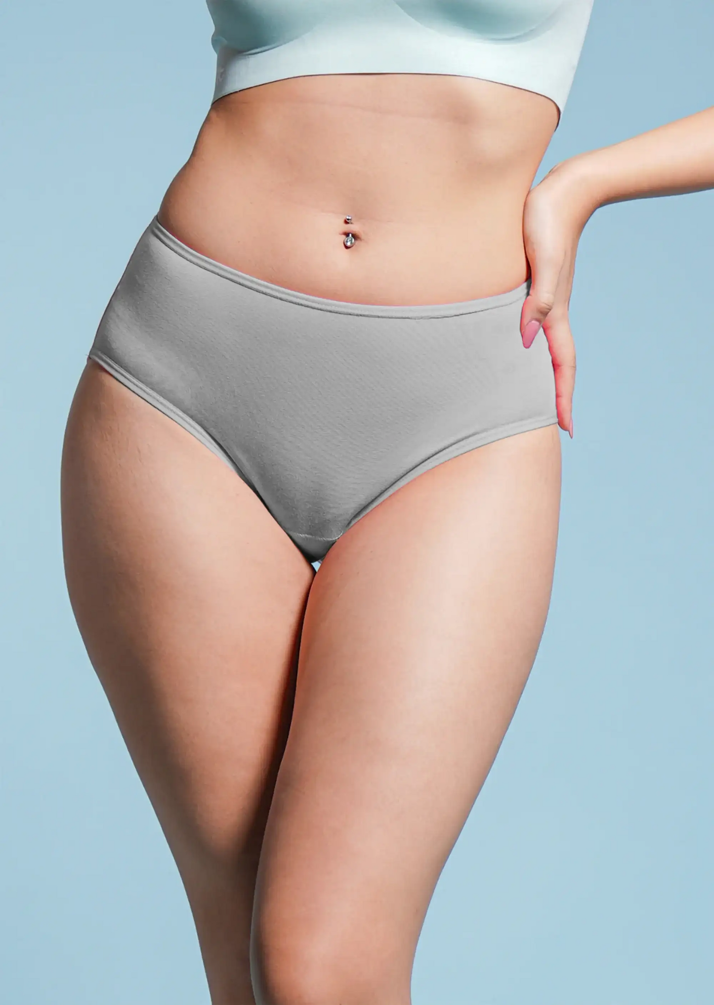 Person wearing gray underwear against a light blue background